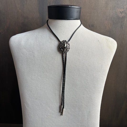 Silver Oval Bolo on Black Leather Tie
