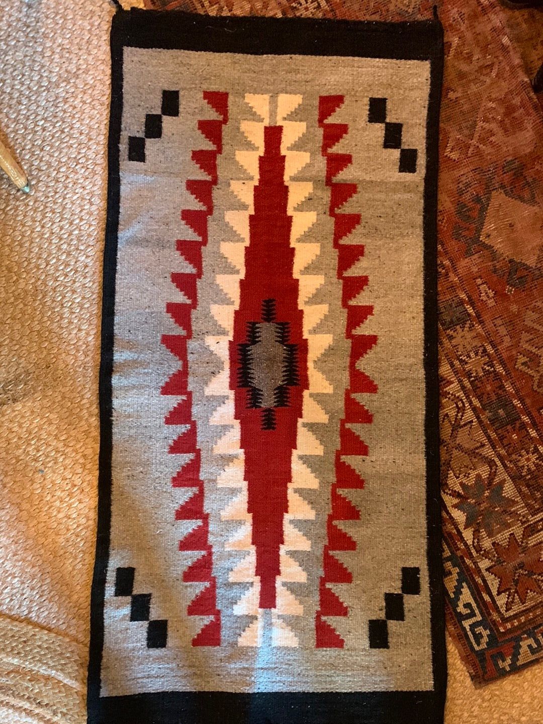 Grey, red, black & cream graphic woven rug