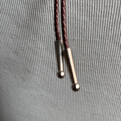 Brown Polished Stone Bolo on Brown Tie