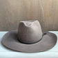 Biltmore grey cowboy hat with black braided leather band