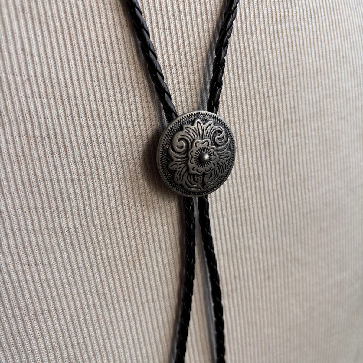 Concho Bolo on Black Leather Tie