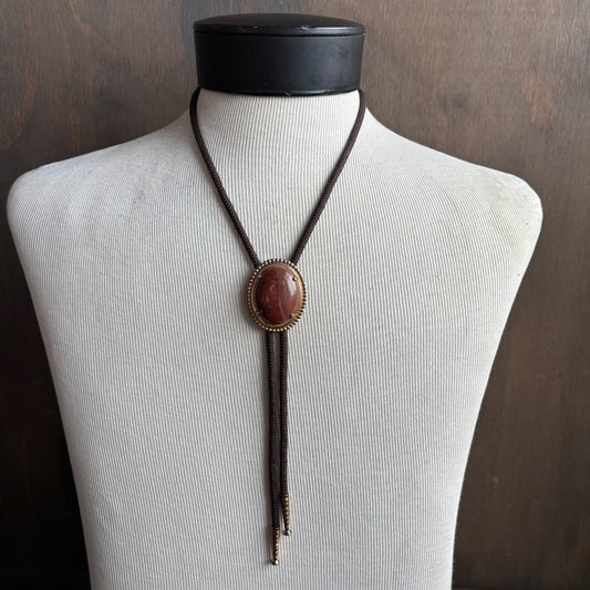 Oval Bolo on Brown Tie