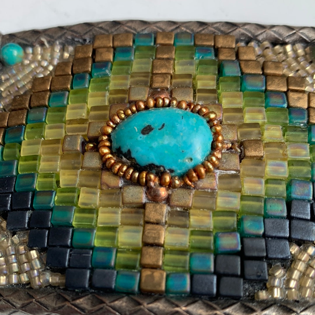 Beaded metal belt buckle with turquoise stones