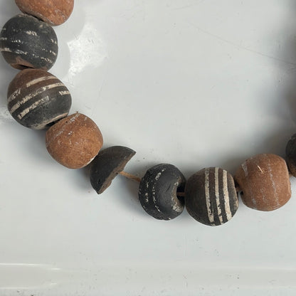 Clay bead strand necklace