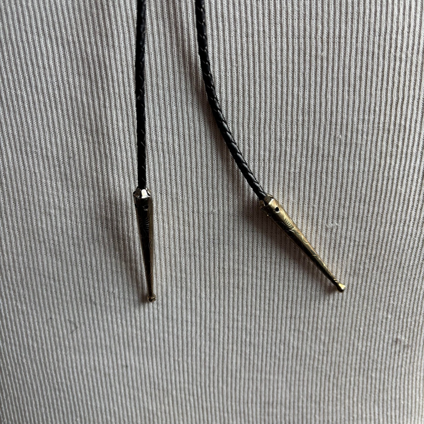 Red Oval Stone Bolo on Black Tie