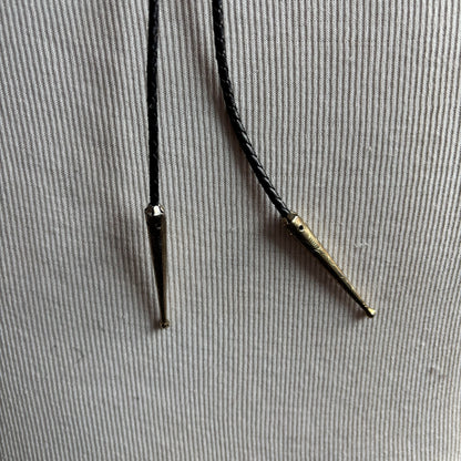 Red Oval Stone Bolo on Black Tie