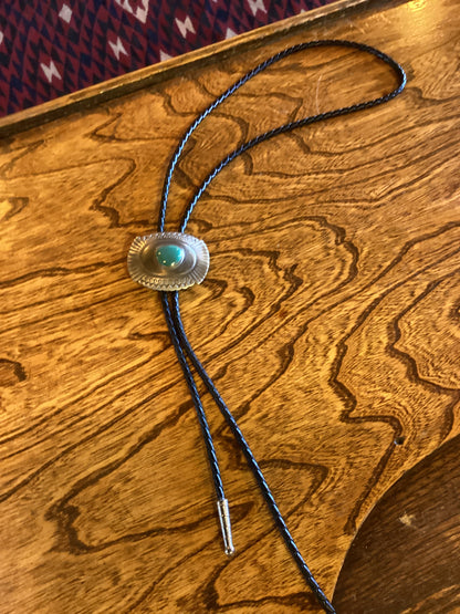 Silver bolo with turquoise color center