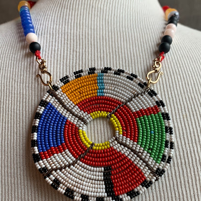 Ostrich Moon Multi colored beaded necklace with seed bead medallion