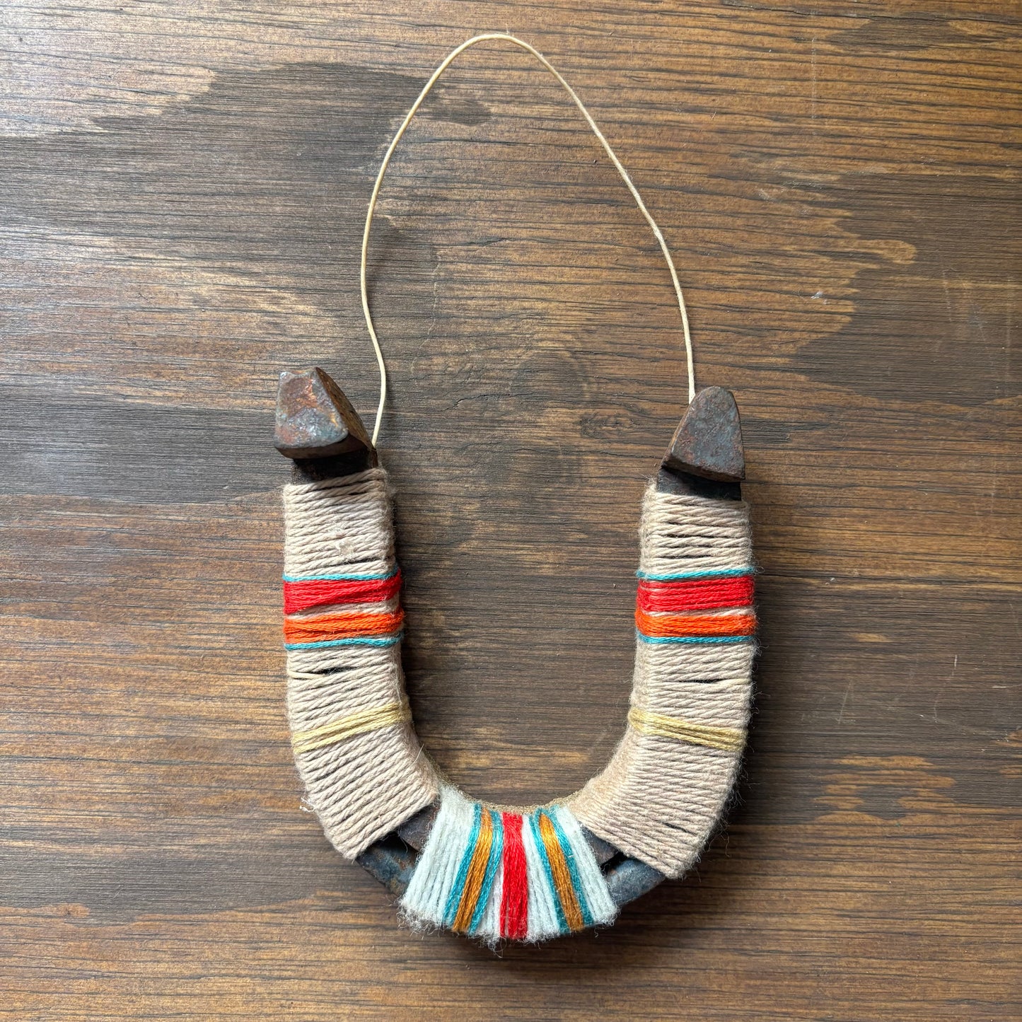 Beige Thread Wrapped Horseshoes