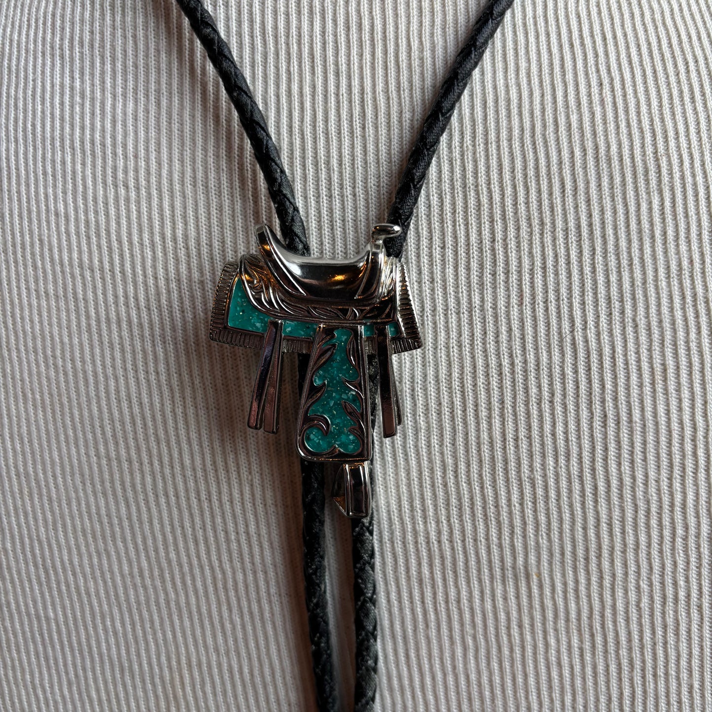 Silver Saddle Bolo on Black Leather Tie