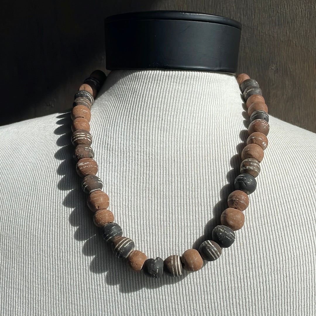 Clay bead strand necklace