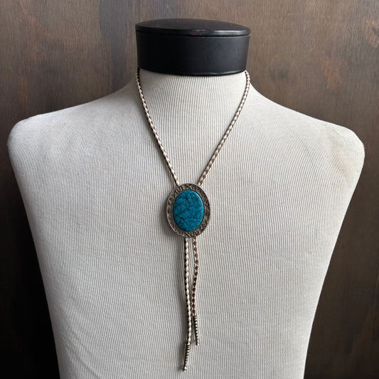 Oval Stone Bolo on Two-Tone Tie