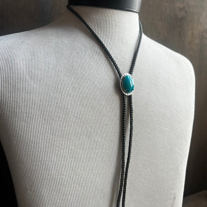 Faux Turquoise Bolo Tie on Black and White Cord
