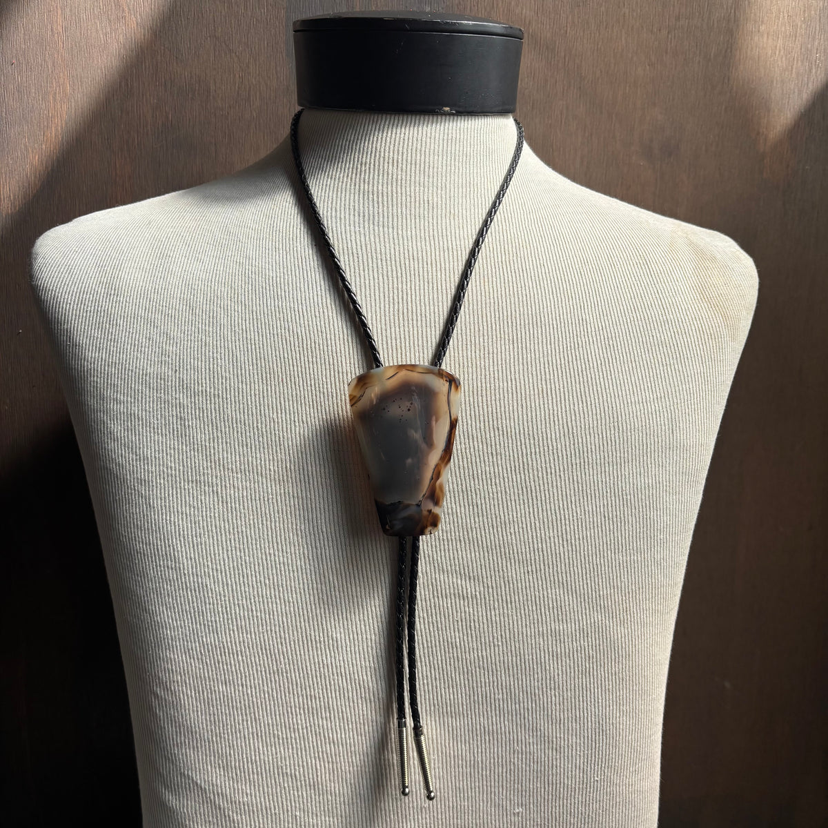 Oversized Stone Bolo on Black Leather Tie