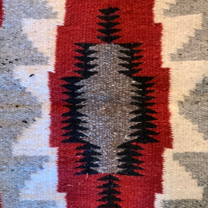 Grey, red, black & cream graphic woven rug