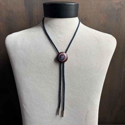 Clay Circle Bolo on Blue Tie