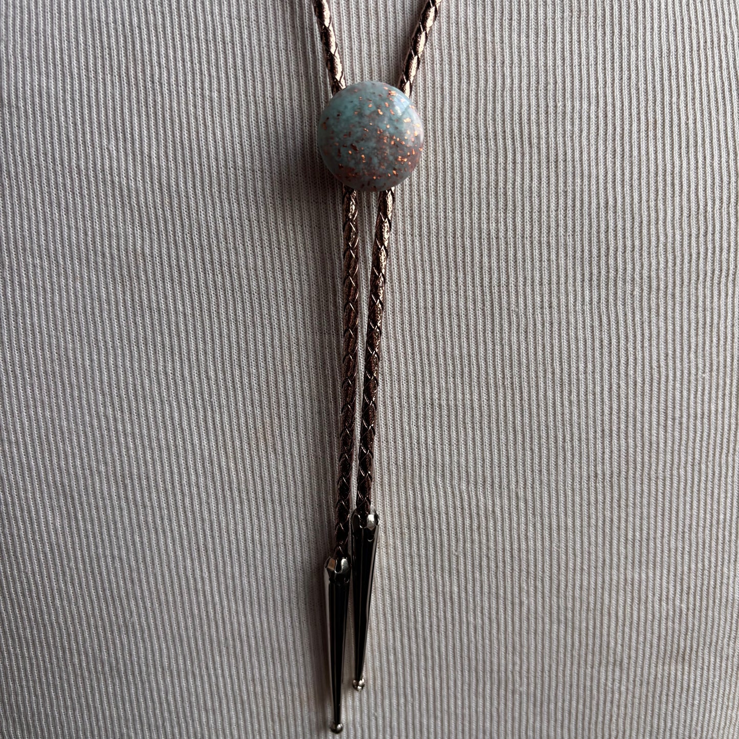 Light Blue Circle Bolo on Gold Leather Tie