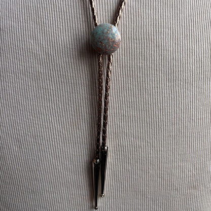 Light Blue Circle Bolo on Gold Leather Tie