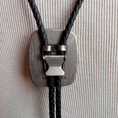 Cody James Black Stone Bolo on Black Leather Tie