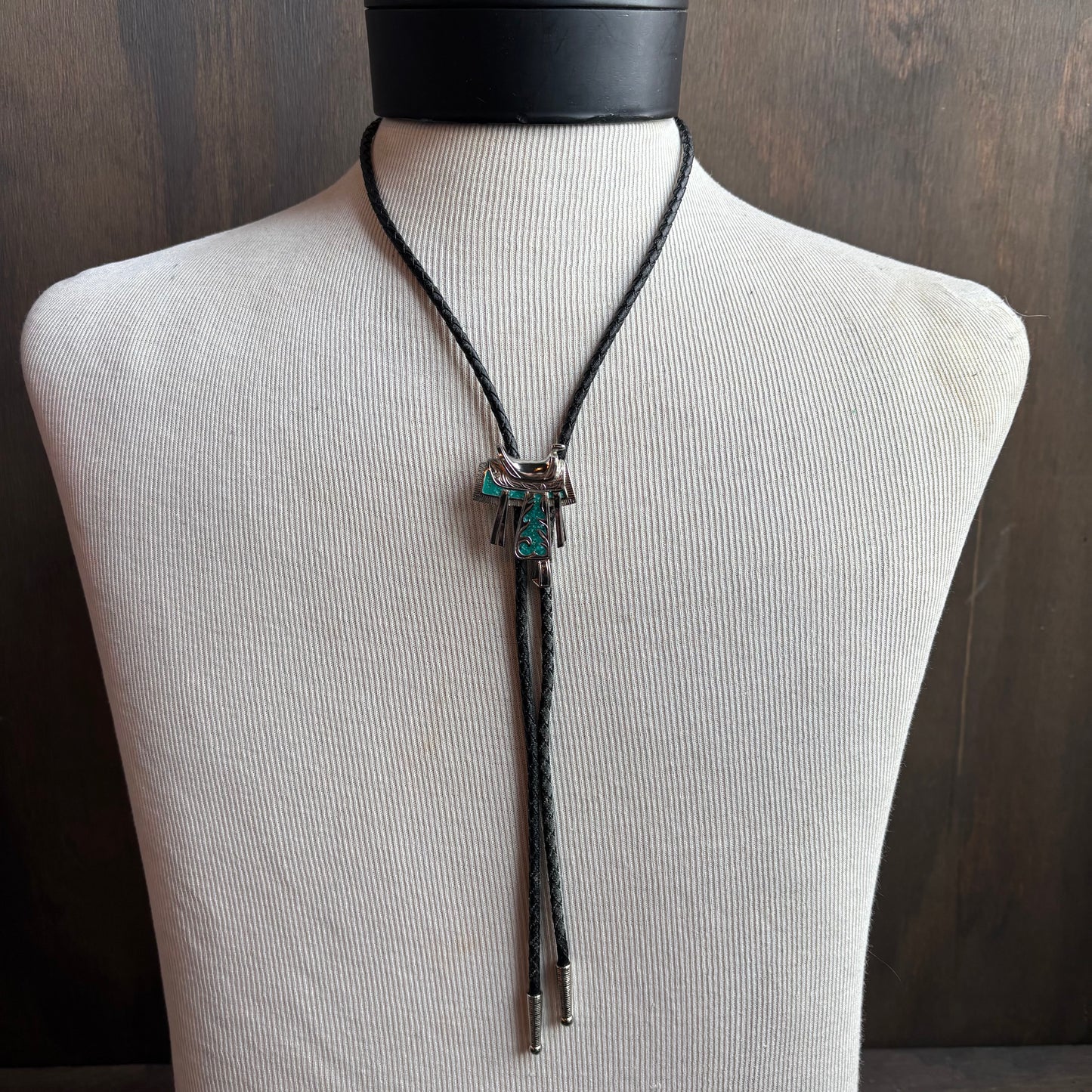 Silver Saddle Bolo on Black Leather Tie