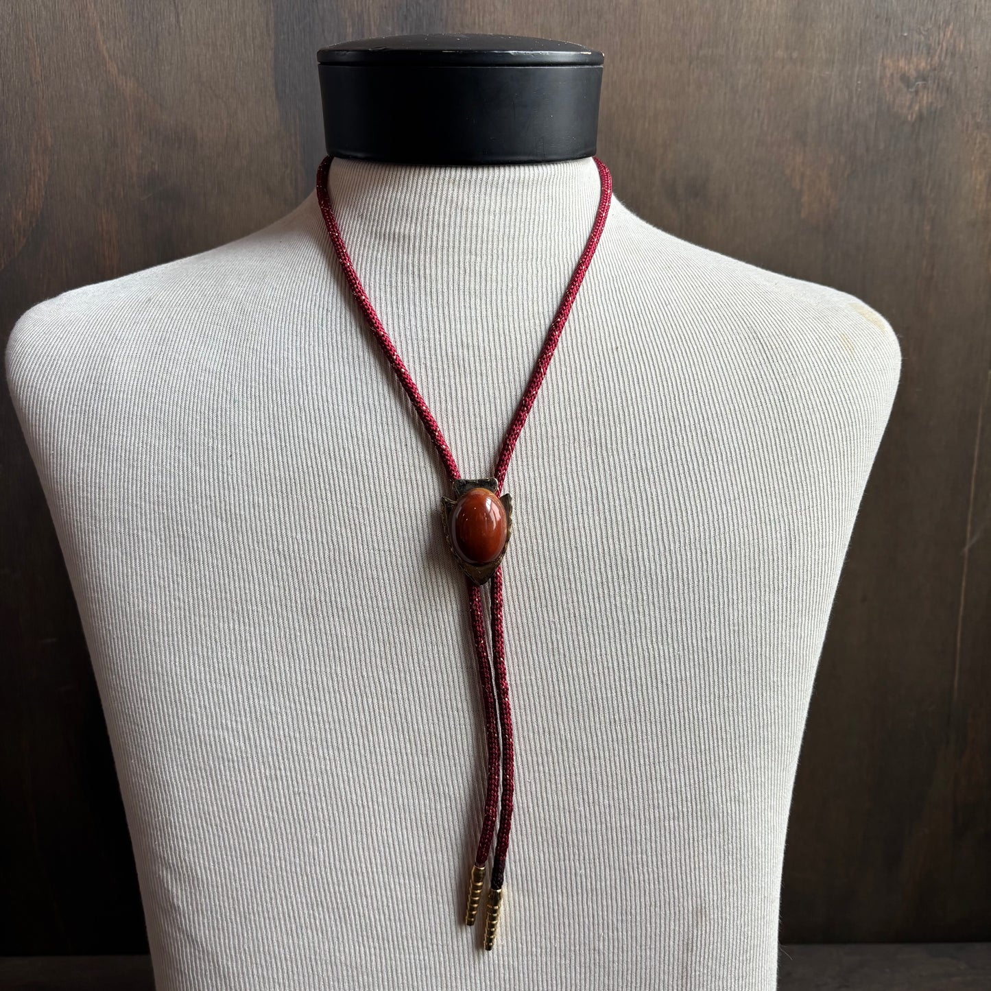 Arrowhead Bolo on Red Tie