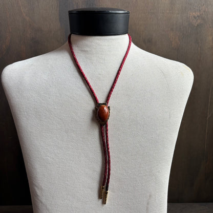 Arrowhead Bolo on Red Tie