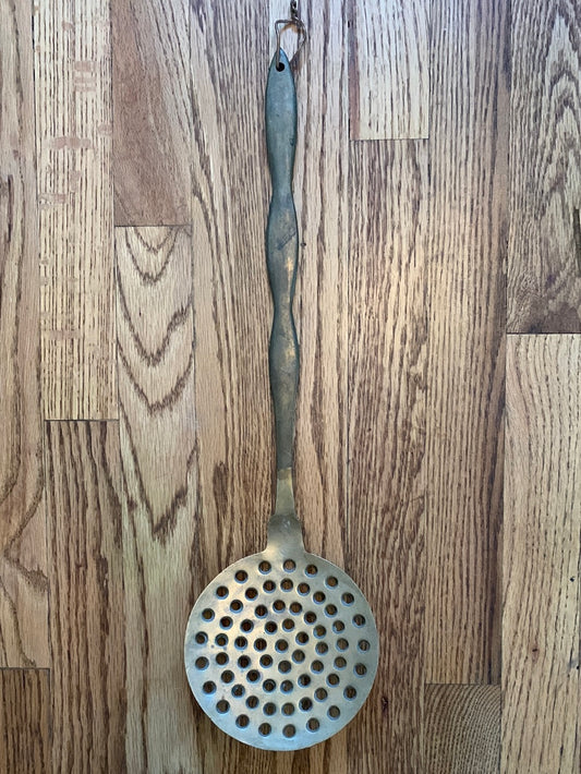 Large metal slotted spoon