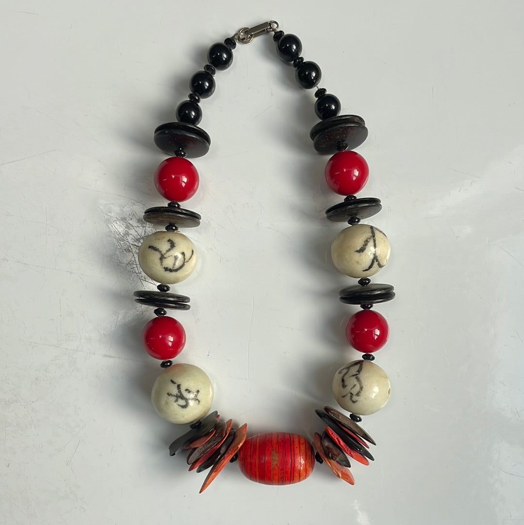 Black brown white and red beaded necklace