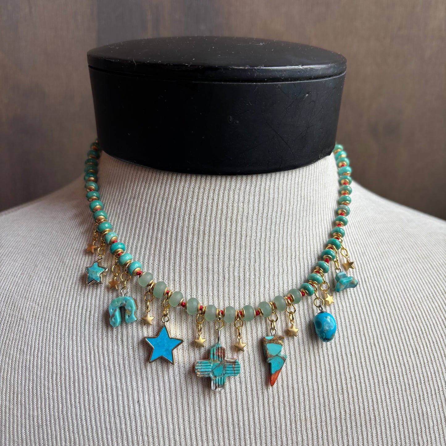 Ostrich Moon Turquoise Balanced Cross Necklace