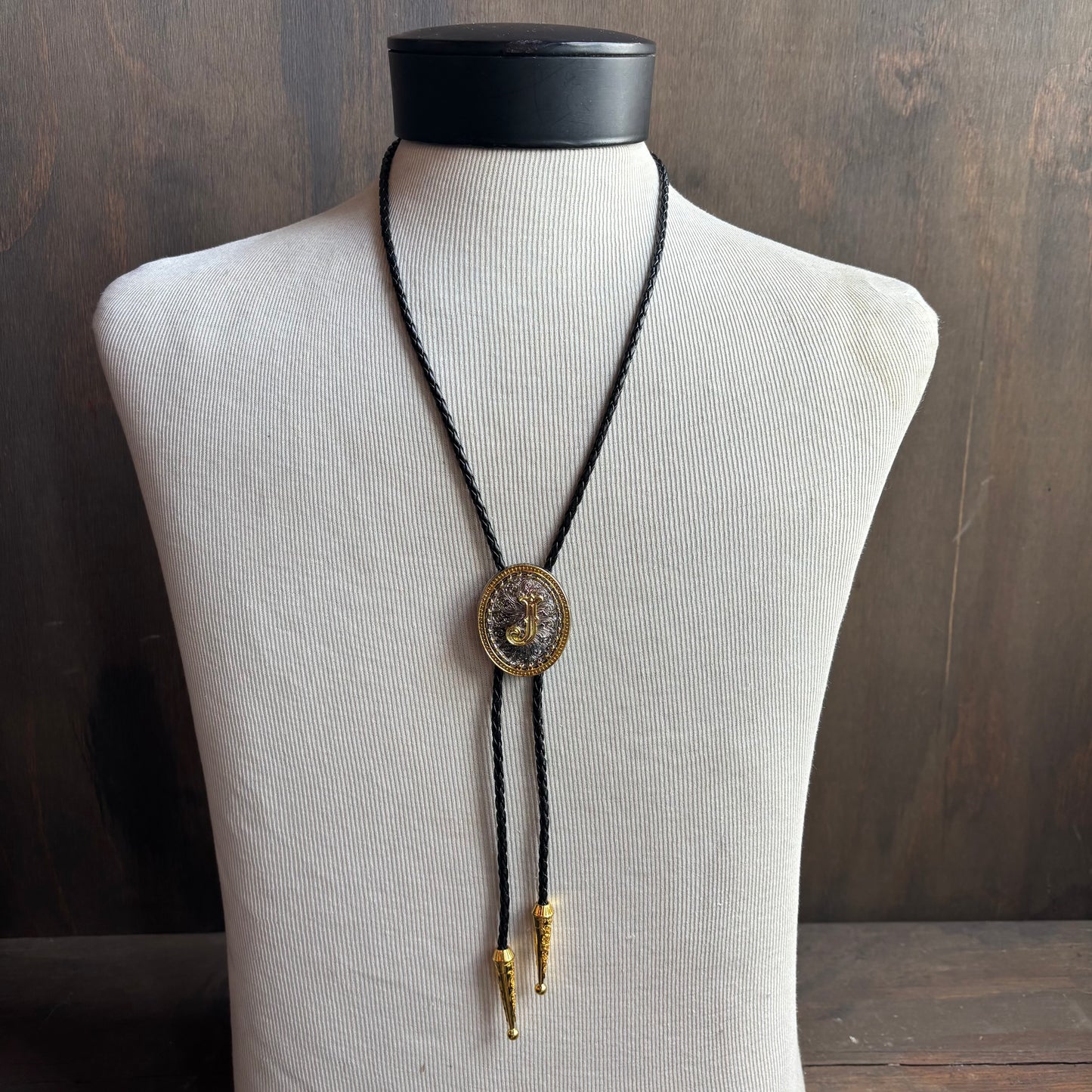 Hollywood Style "J" Bolo on Black Leather Tie