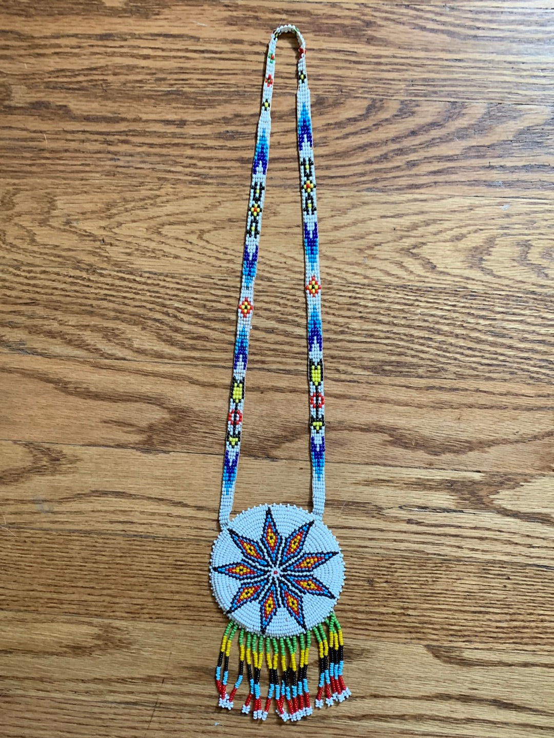 Beaded multi-color medallion necklace with fringe