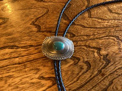 Silver bolo with turquoise color center