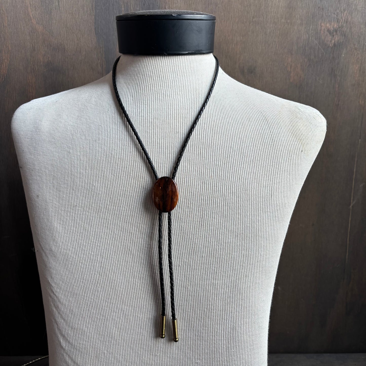 Wood Oval Bolo on Black Leather Tie