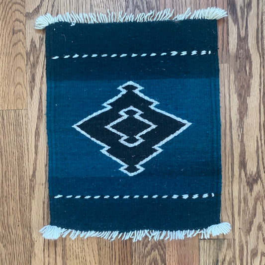 Teal, black & cream weaving