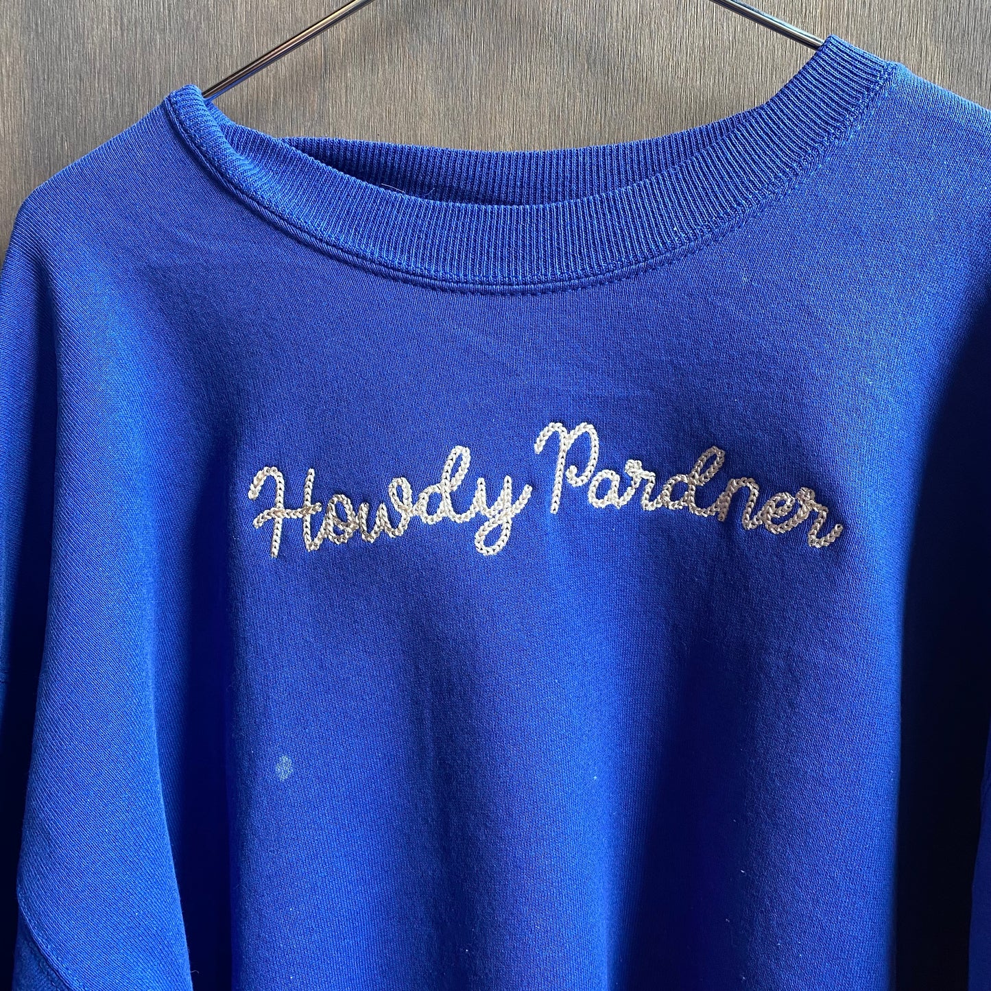 Custom blue “howdy pardner” sweatshirt