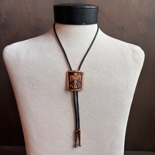 Vintage Copper Thunderbird Bolo on Black Leather Tie