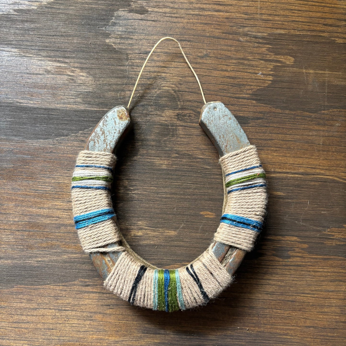 Beige Thread Wrapped Horseshoes
