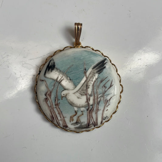 Blue landing bird pendant