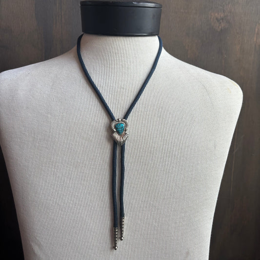 Blue Stone Bolo on Blue Tie