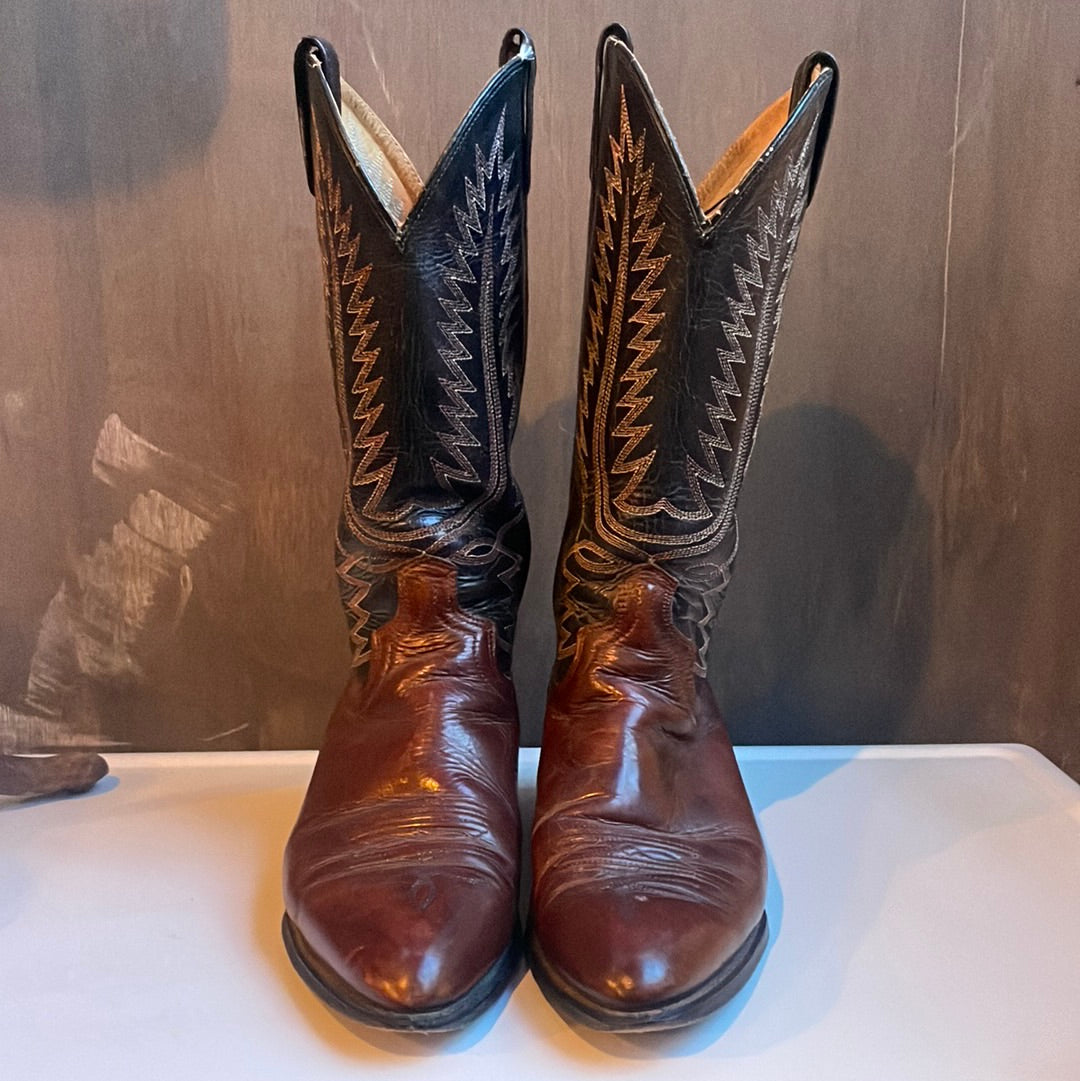 Brown and black cowboy boots