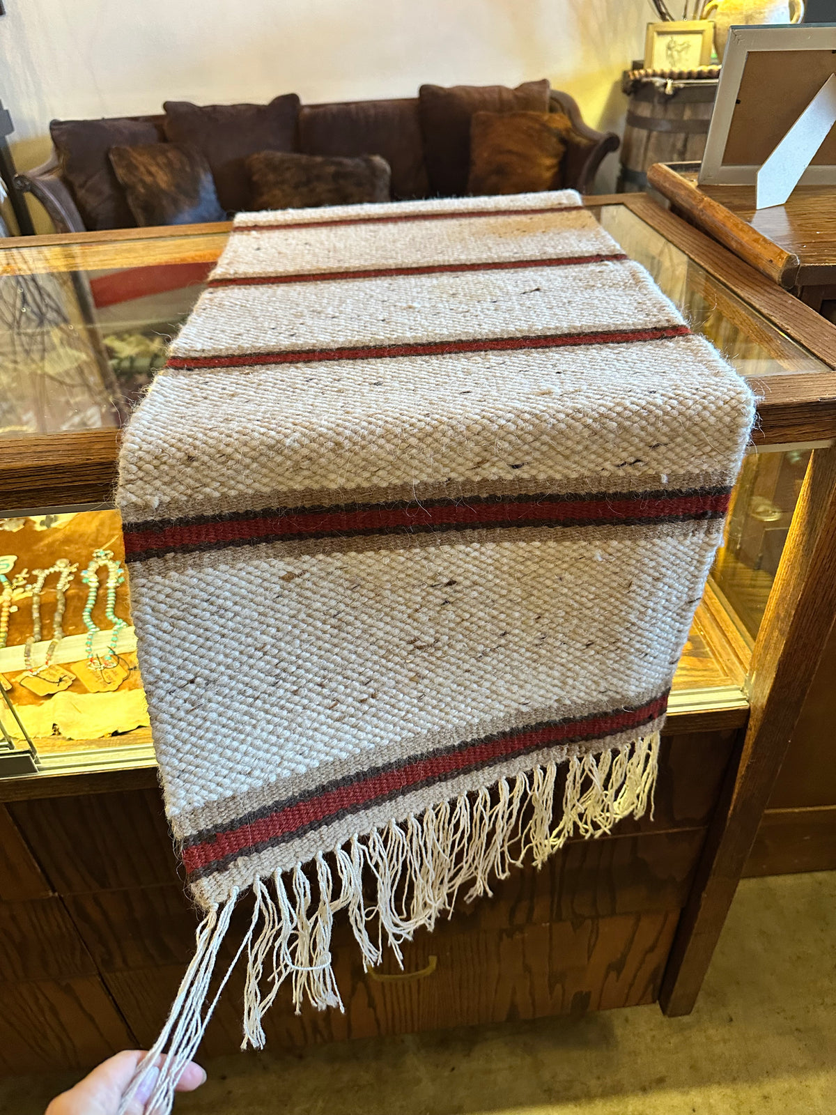 Woven rug white, red, brown