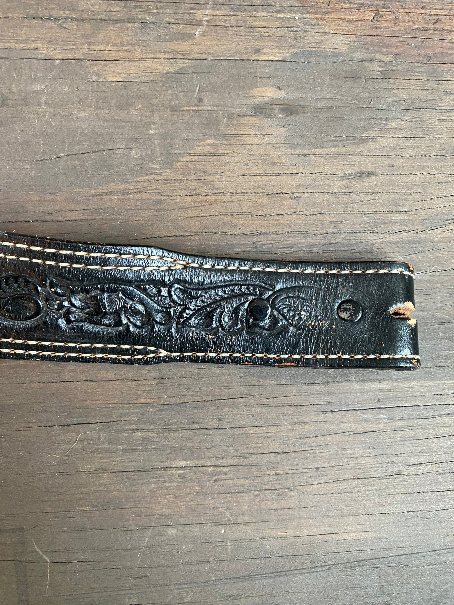 Black tooled leather belt