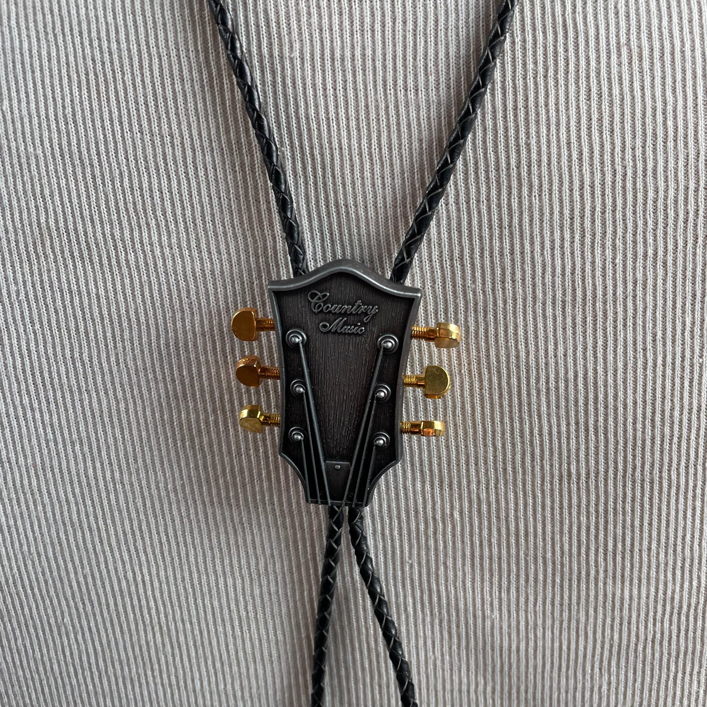 Vintage guitar head bolo tie