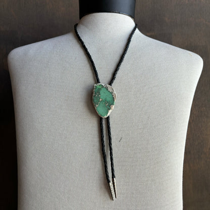 Polished Turquoise Stone Bolo on Black Tie