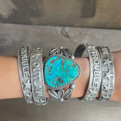 “Outlaw” Wordy Silver Bangle