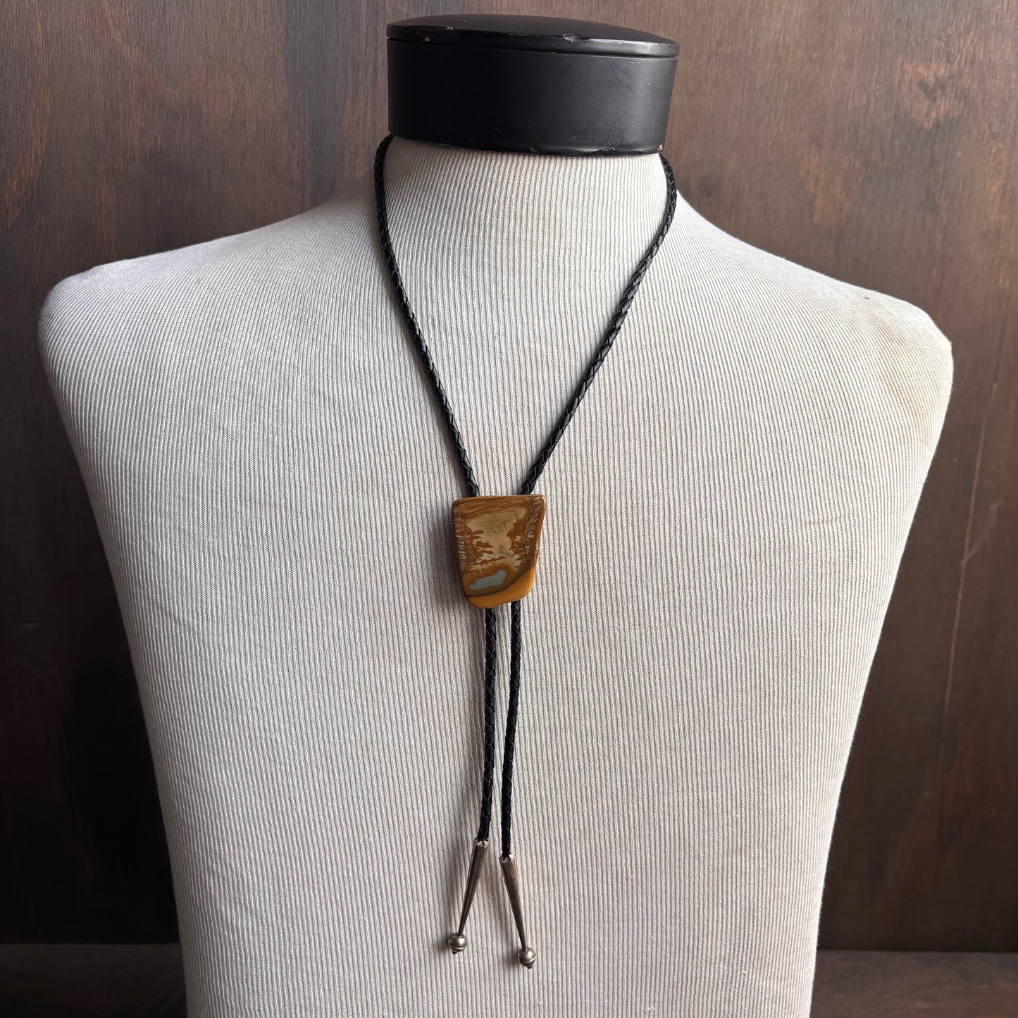 Polished Stone Bolo on Black Leather Tie