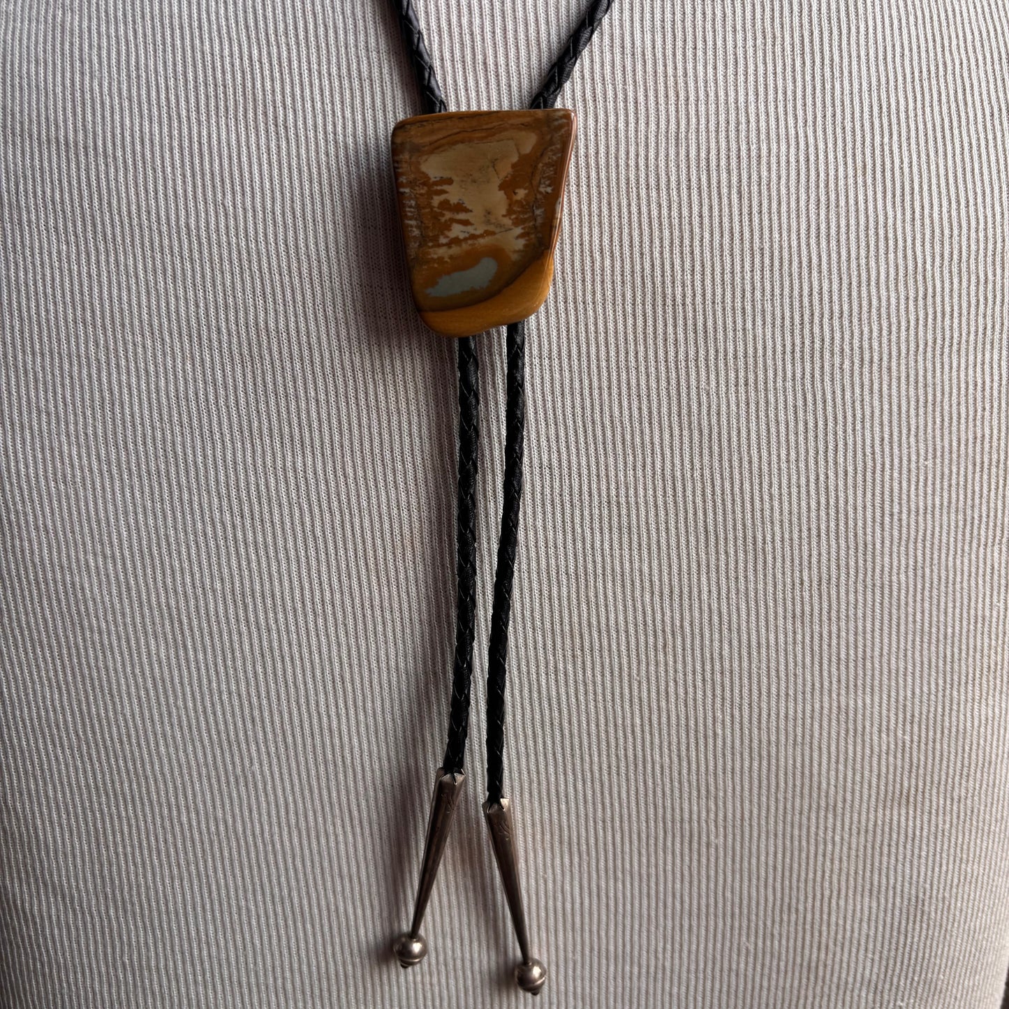 Polished Stone Bolo on Black Leather Tie