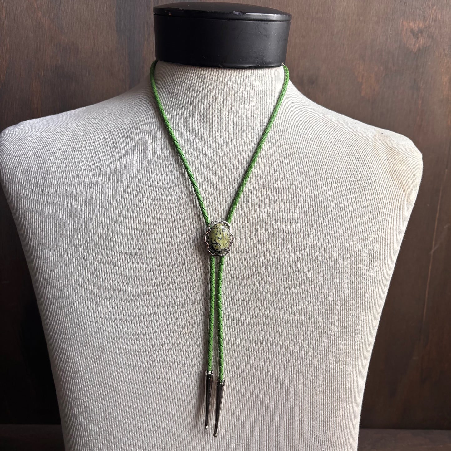 Green Stone Bolo on Green Leather Tie