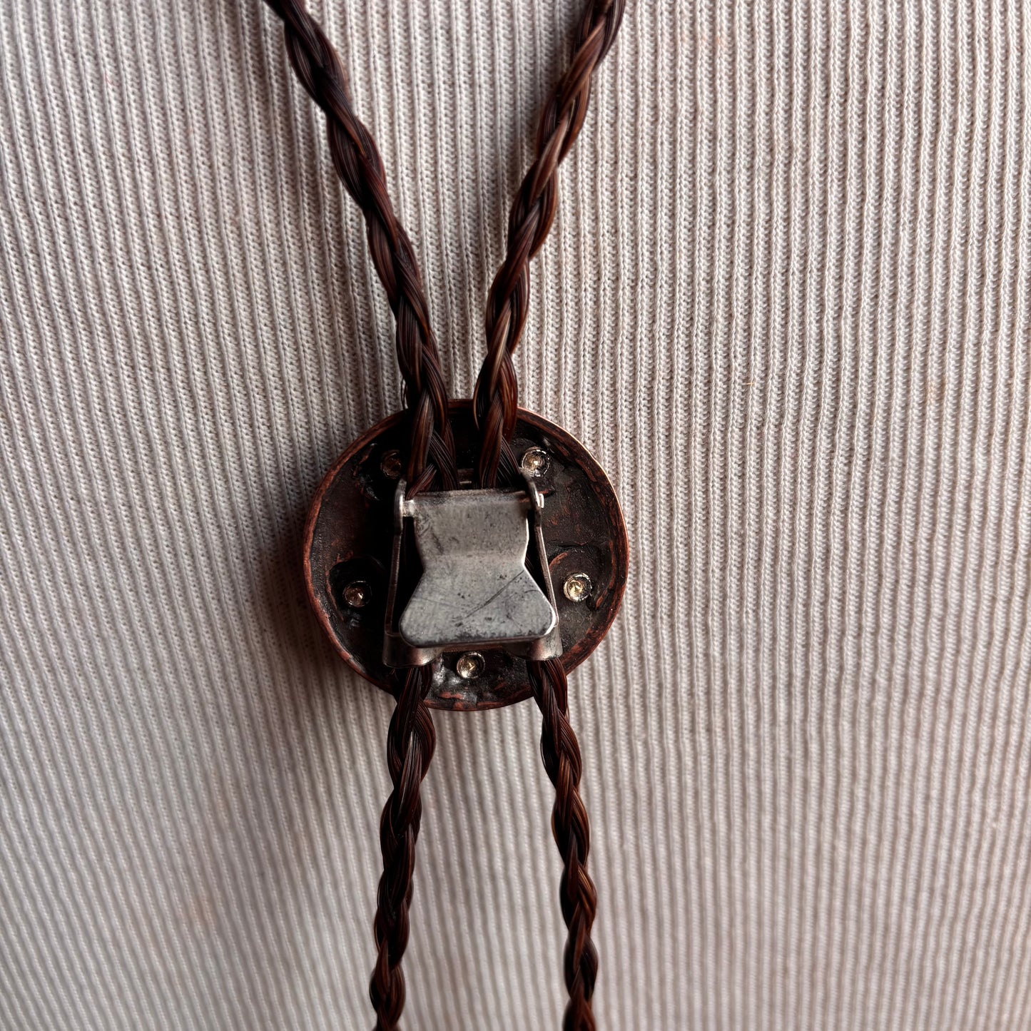 Longhorn Bolo on Brown Braided Tie