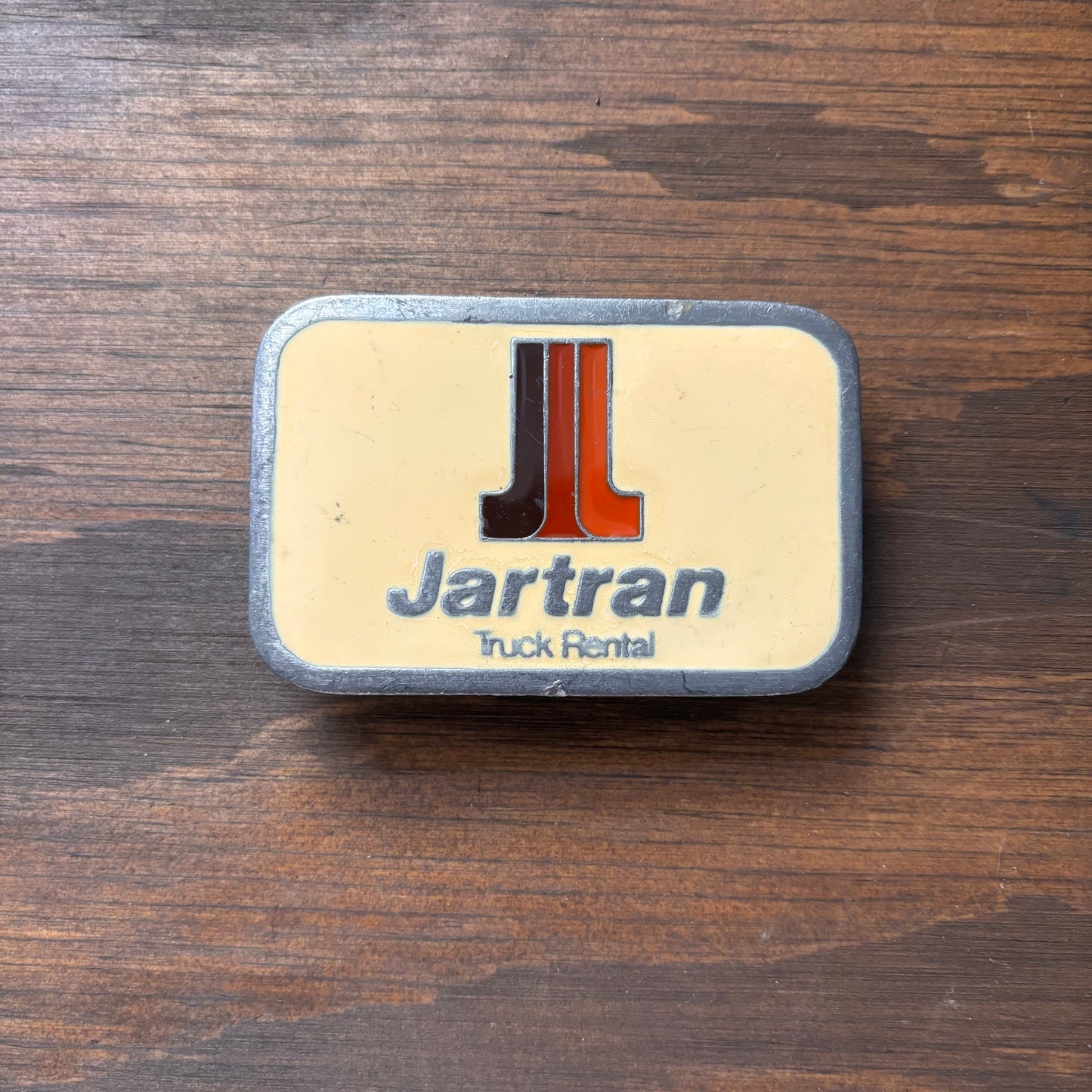 Vintage Enamel Jartran Truck Rental Belt Buckle